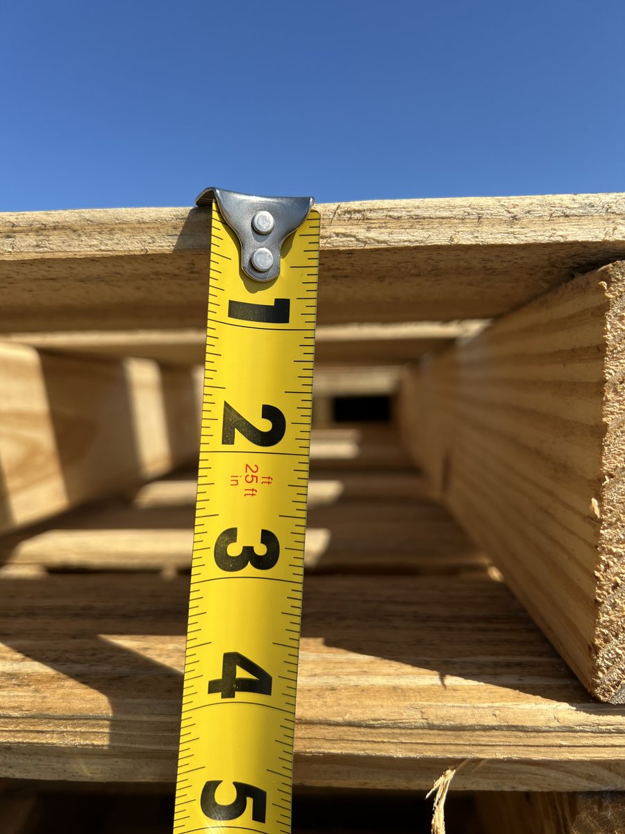 Tape measure measuring GMA 48x40 pallet stringer dimensions quality inspection